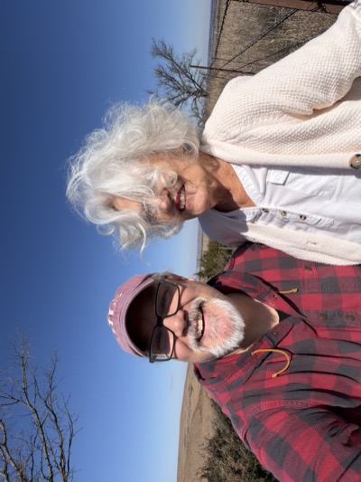 Tom with family outdoors